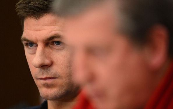 England captain Steven Gerrard listens as England coach Roy Hodgson answers questions during an England press conference at the Ramada hotel ahead of tomorrow's FIFA Group H qualifier between Montenegro and England on March 25, 2013 in Podgrorica, Montenegro. (Photo by Mike Hewitt/Getty Images)